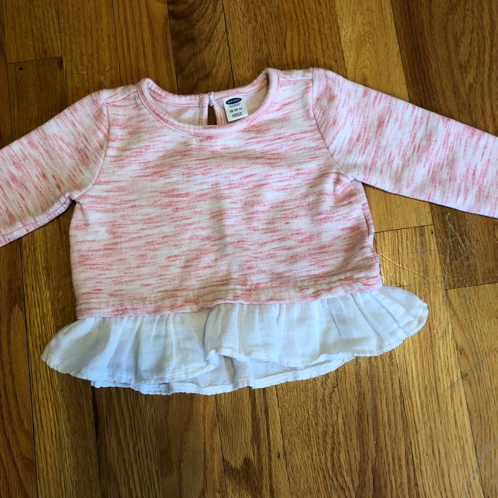 Pink sweater with ruffle bottom